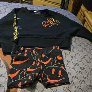 Nike Black Smiley Face Outfit with Red and Yellow Accents